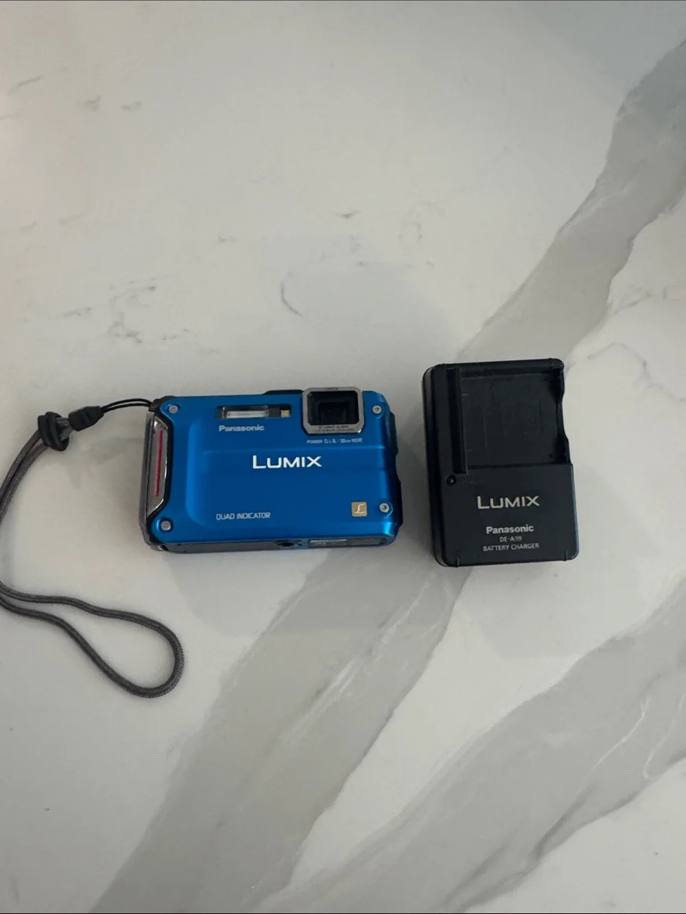 Panasonic Lumix Compact Digital Camera in Blue with Charger
